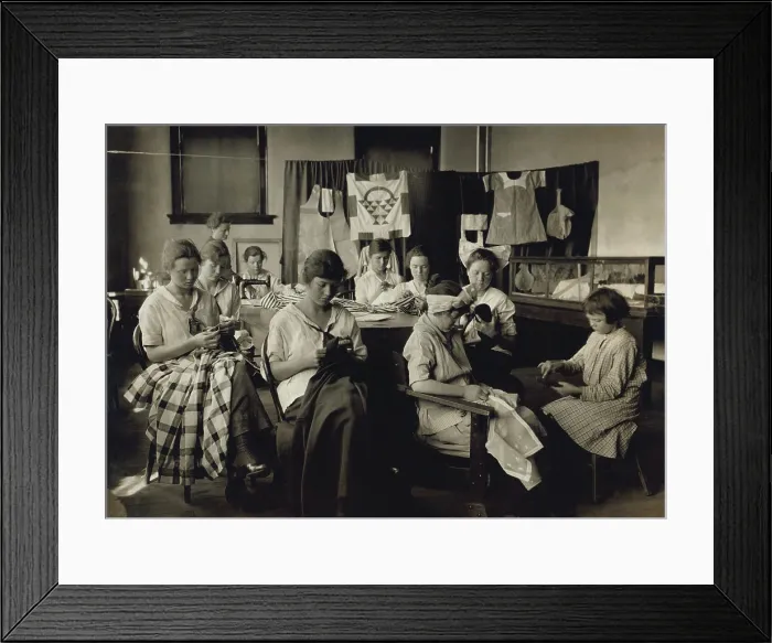 Framed Print : Deaf-mute girls sewing and darning in a training school in Sulphur, Oklahoma. April 1917 photo by Lewis Hine