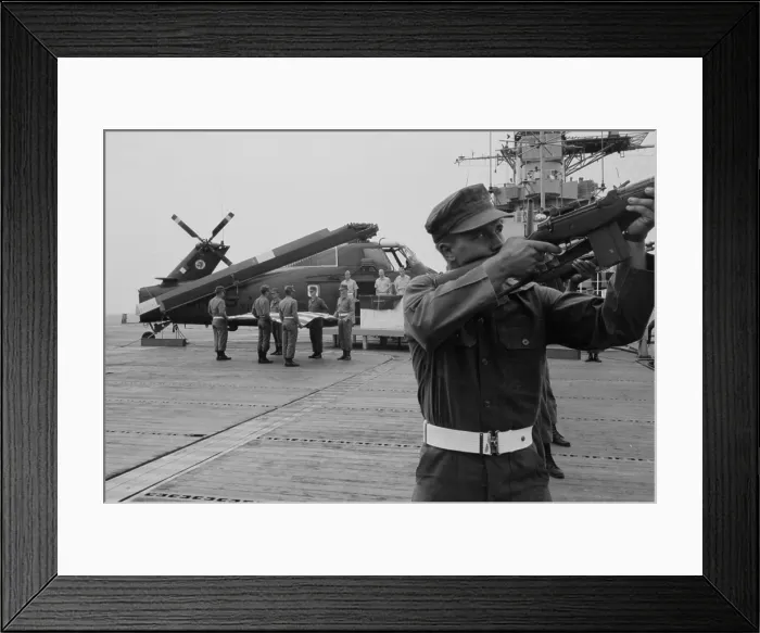 Framed Print : Vietnam War. A rifle salute to seven US Marines killed on April 29, 1966 by a Viet Cong bomb hidden in a drinking hole, during Operation Osage