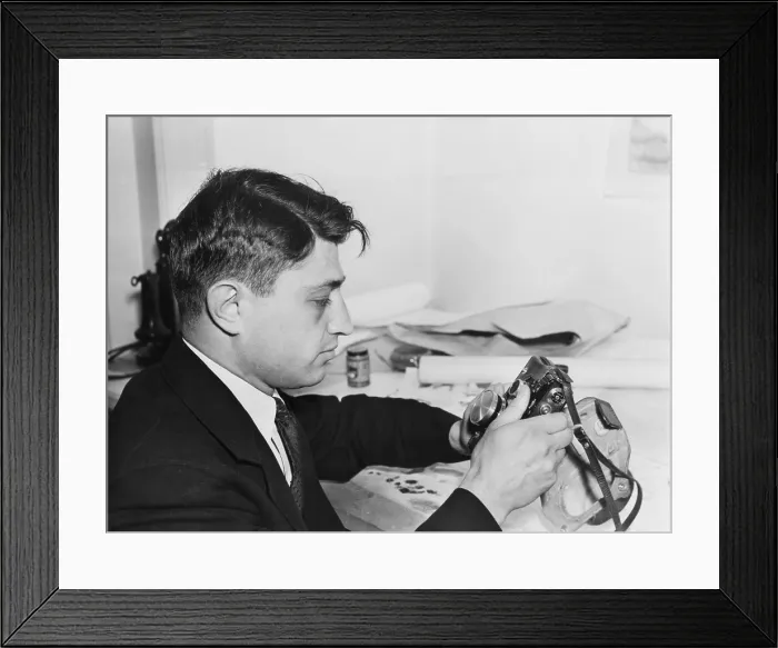 Framed Print : Carl Mydans (1907-2004), at the Farm Security Administration with camera equipment, November, 1935