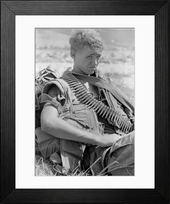 Framed Print : Vietnam War. US Marine takes a break during a ground movement 25 miles north of An Hoa, North Vietnam. 1969