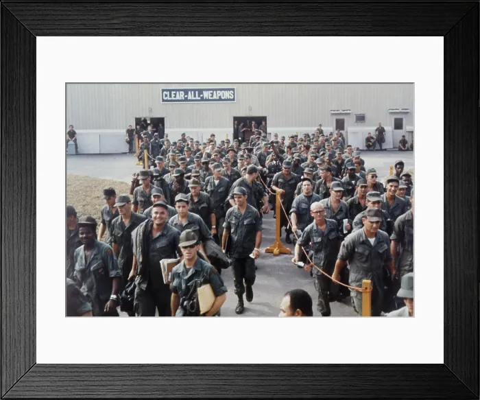 Framed Print : Vietnam War. Having finished their tours of duty, smiling US troops wait at the Bien Hoa Air Terminal for a National Airlines flight home. Feb. 15, 1968 Framed Print : Vietnam War. Having finished their tours of duty, smiling US troops wait at the Bien Hoa Air Terminal for a National Airlines flight home. Feb. 15, 1968