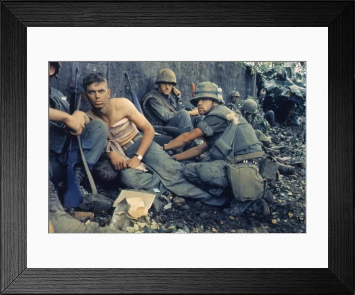 Framed Print : Vietnam War-Tet Offensive. A medic treats a US Marine's wounds during Operation Hue City. Feb. 6, 1968
