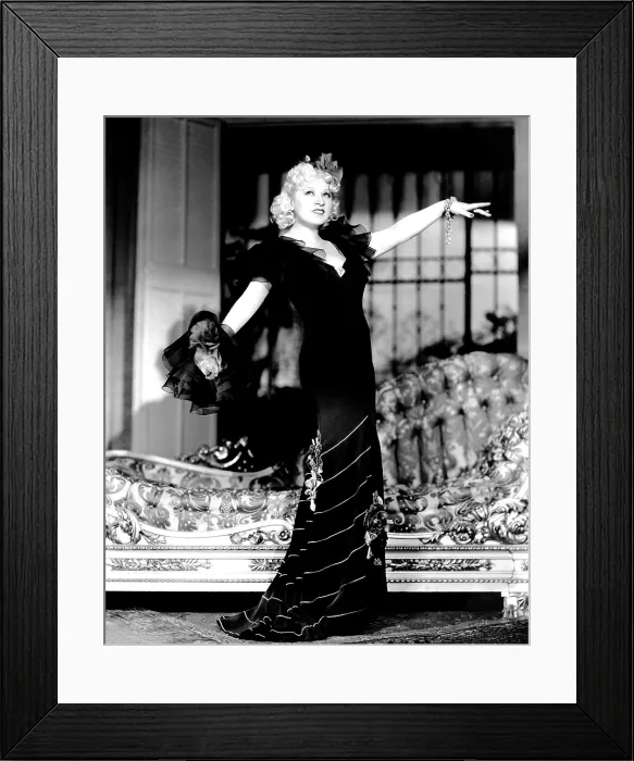 Framed Print : EVERY DAY'S A HOLIDAY, Mae West (in a gown by Elsa Schiaparelli), 1937
