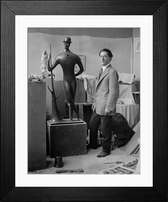 Framed Print : Elie Nadelman (1882-1946), Polish-born American sculptor in his studio with one of his best known works, MAN IN THE OPEN AIR, ca. 1915