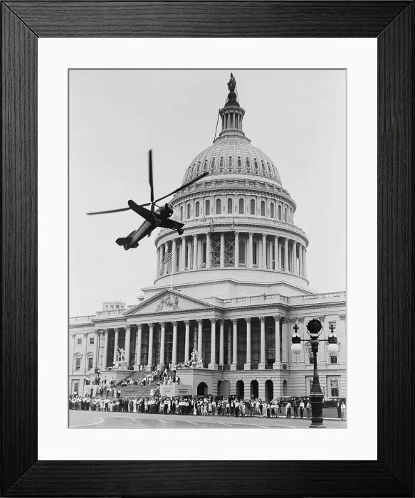Framed Print : Autogiro airplane, similar to a helicopter, takes off from the east plaza of the U.S. Capitol with Senator Hiram Bingham as a passenger. July 9, 1931