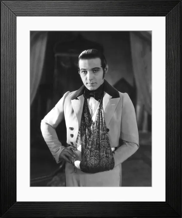 Framed Print : THE EAGLE, Rudolph Valentino, on-set with his arm in a sling after an automobile accident, 1925 Framed Print : THE EAGLE, Rudolph Valentino, on-set with his arm in a sling after an automobile accident, 1925