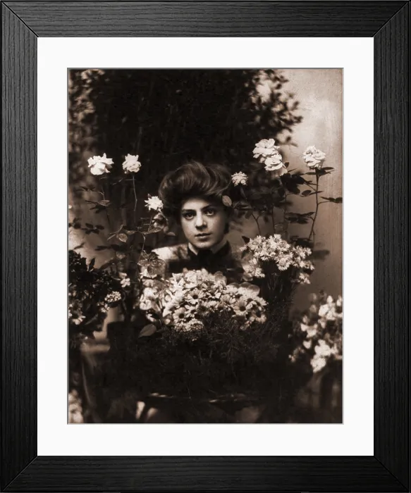 Framed Print : Ethel Barrymore (1879-1959), American actress behind bouquet of flowers. Photo by Burr McIntosh (1862-1942)