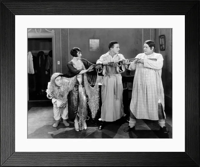 Framed Print : SLIPPING WIVES, from left: Stan Laurel, Priscilla Dean, Herbert Rawlinson, Oliver Hardy, 1927
