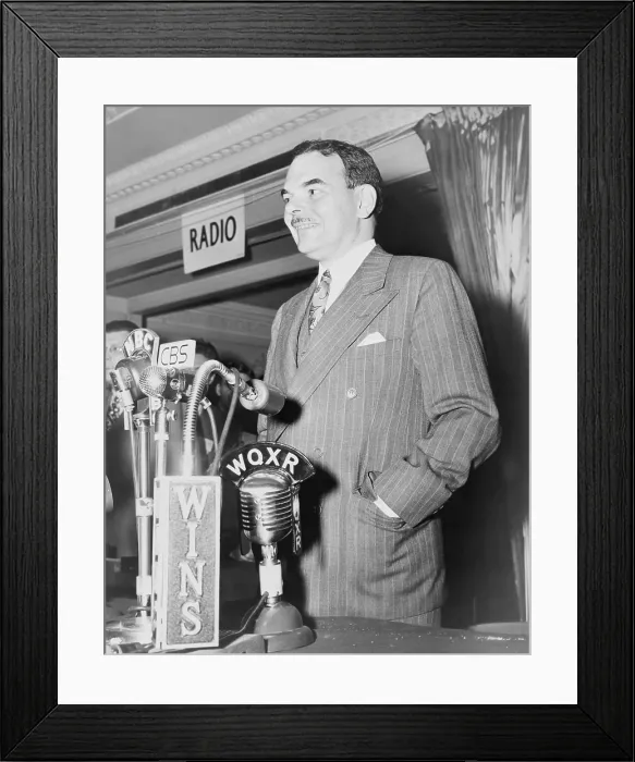 Framed Print : 1948 Republican Presidential candidate, Thomas E. Dewey (1902-1971), before microphones at a press conference in New York, following his upset loss to President Truman. 1948