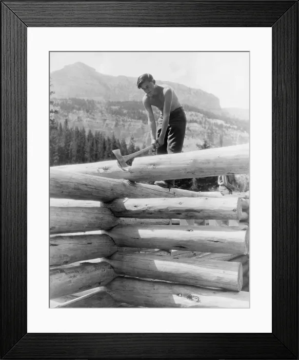 Framed Print : Civilian Conservation Corp worker cutting a coped joint on log cabin at Granite Creek, Teton National Forest, Wyoming in 1937