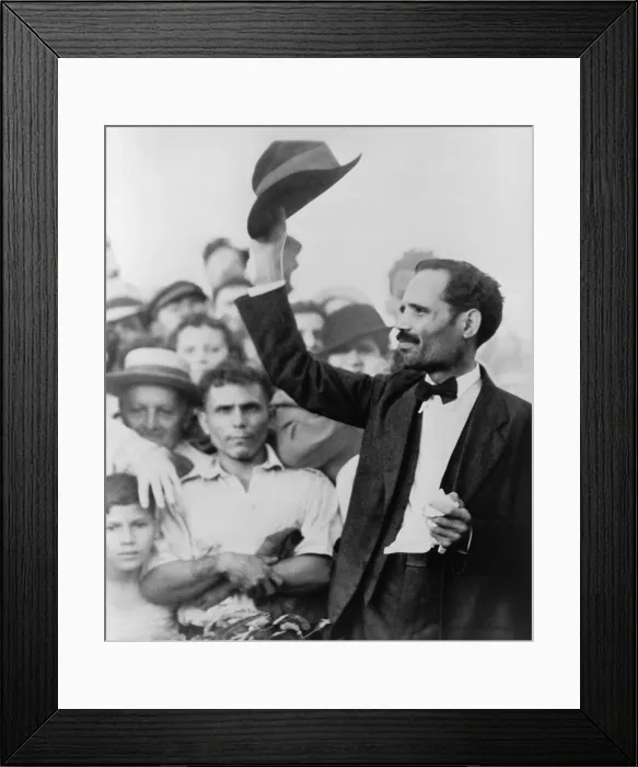 Framed Print : Pedro Albizu Campos (1893-1965), Puerto Rican nationalist, raising his hat to a crowd as he is arrested following the deadly shooting of a policeman by two nationalists Framed Print : Pedro Albizu Campos (1893-1965), Puerto Rican nationalist, raising his hat to a crowd as he is arrested following the deadly shooting of a policeman by two nationalists