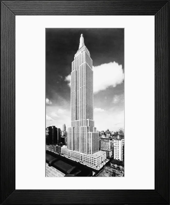 Framed Print : Empire State Building as depicted in a 1931. The lower part is a photographic image, which transitions into a painted image in the upper half. 1931 Framed Print : Empire State Building as depicted in a 1931. The lower part is a photographic image, which transitions into a painted image in the upper half. 1931