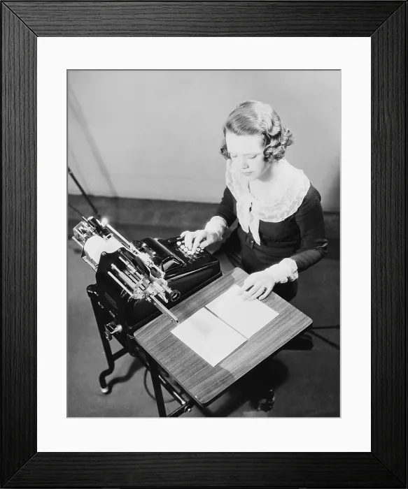 Framed Print : Young female government employee using an adding machine. Ca. 1935 Framed Print : Young female government employee using an adding machine. Ca. 1935