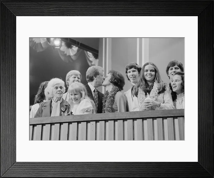 Framed Print : 1976 Democratic Convention. Jimmy and Rosalynn Carter kissing, surrounded by family, including young daughter Amy and mother Lillian Carter Framed Print : 1976 Democratic Convention. Jimmy and Rosalynn Carter kissing, surrounded by family, including young daughter Amy and mother Lillian Carter