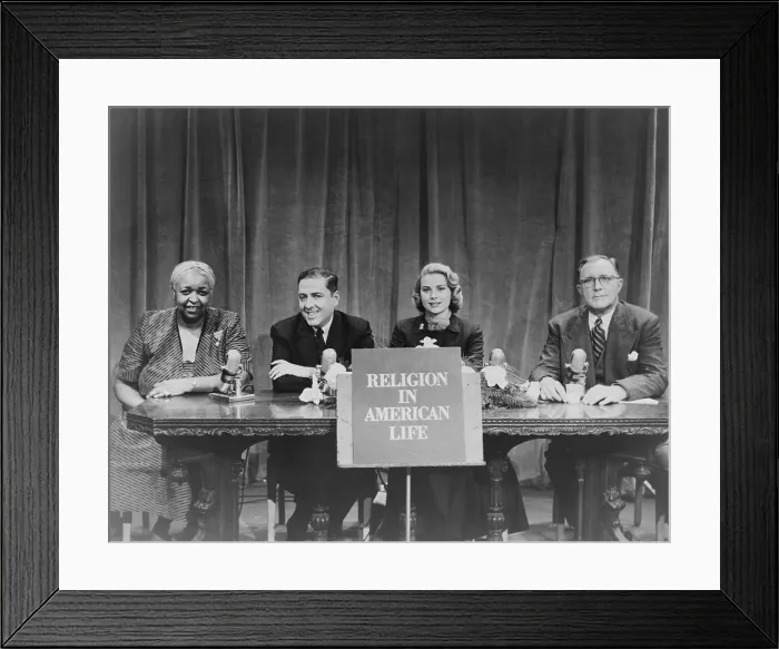 Framed Print : Grace Kelly appears with Ethel Waters, Herman Wouk, and Charles E. Wilson on a panel in a television program of the organization Religion in American Life. 1953