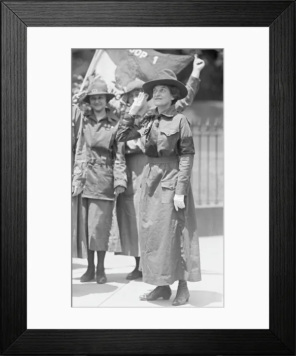 Framed Print : Juliette Gordon Low, founder of the Girl Scouts of the USA, salutes while wearing a Girl Scout uniform. 1917 Framed Print : Juliette Gordon Low, founder of the Girl Scouts of the USA, salutes while wearing a Girl Scout uniform. 1917