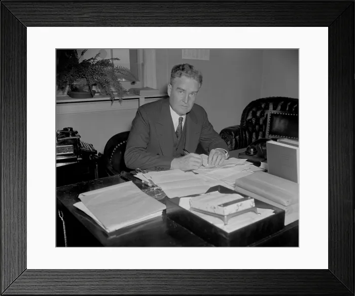 Framed Print : Bruce Barton at his desk, possibly when the adman and author served in Congress from 1937 to 1941. (BSLOC_2013_7_116)
