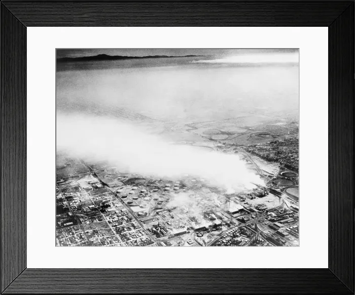 Framed Print : Smoke from an oil refinery drifts across Los Angeles area on October 28, 1954 Framed Print : Smoke from an oil refinery drifts across Los Angeles area on October 28, 1954