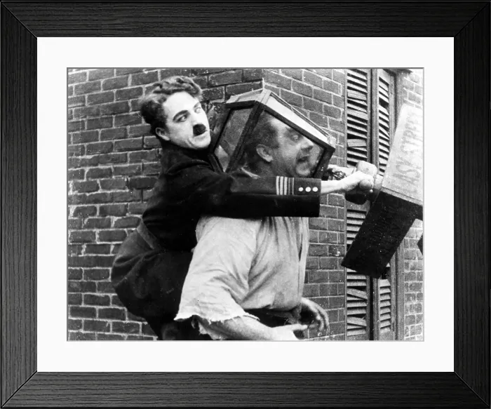 Framed Print : EASY STREET, Charles Chaplin, Eric Campbell, 1917 Framed Print : EASY STREET, Charles Chaplin, Eric Campbell, 1917