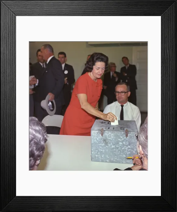 Framed Print : 1964 Presidential Election. Lady Bird Johnson places her vote in the ballot box at Johnson City, Texas. Nov. 3, 1964
