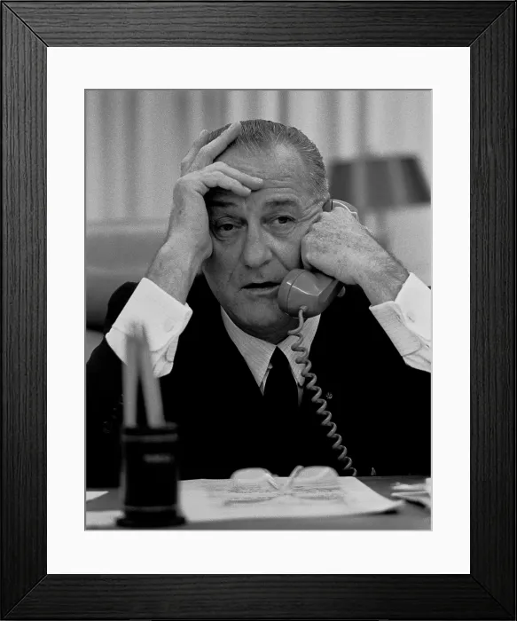 Framed Print : President Lyndon Johnson on the telephone in the White House. July 17, 1965