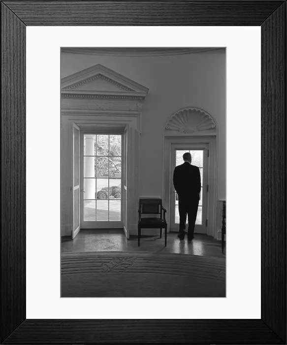 Framed Print : President Lyndon Johnson looking out doorway of the Oval Office. Jan. 24, 1966