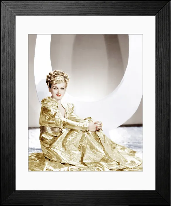 Framed Print : ARTISTS AND MODELS ABROAD, Joan Bennett wearing a gold lame negligee designed by Edith Head, 1938 Framed Print : ARTISTS AND MODELS ABROAD, Joan Bennett wearing a gold lame negligee designed by Edith Head, 1938