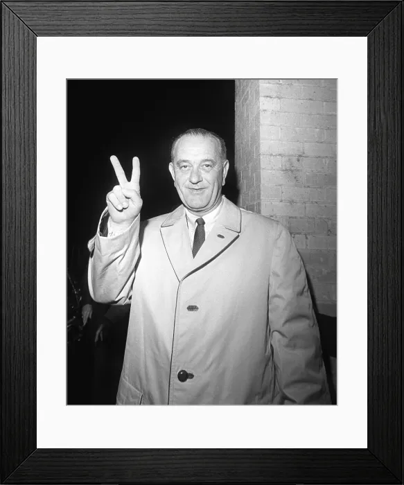 Framed Print : 1964 Presidential Election. Lyndon Johnson gives the victory sign at the Driskill Hotel, where he waited to hear the election results. Austin, Texas. Nov. 3, 1964 Framed Print : 1964 Presidential Election. Lyndon Johnson gives the victory sign at the Driskill Hotel, where he waited to hear the election results. Austin, Texas. Nov. 3, 1964
