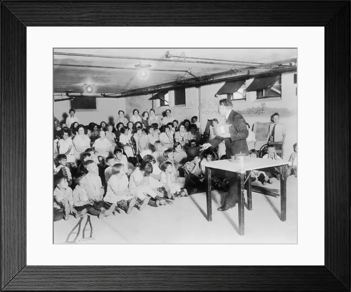 Framed Print : Houdini performs for an audience of hospitalized children. Ca. 1925
