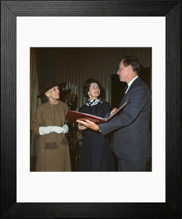 Framed Print : Alice Roosevelt Longworth returns to the White House. Lady Bird Johnson and Teddy Roosevelt's oldest child, Alice are shown an album at the White House, March 21, 1966
