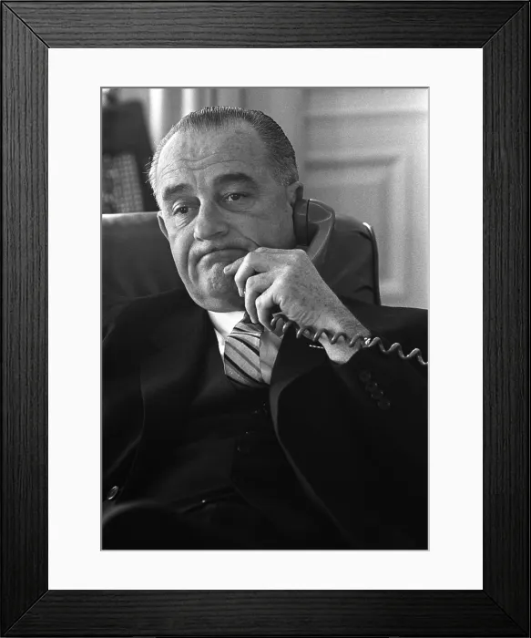 Framed Print : President Lyndon Johnson on the telephone in the Oval Office, White House. Jan. 10, 1964