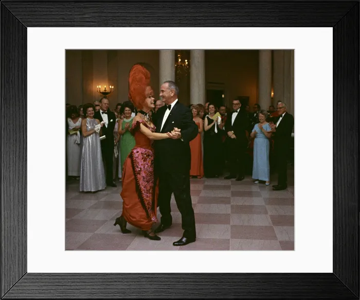 Framed Print : President Lyndon Johnson dancing with Carol Channing. Channing wears her costume from an earlier White House performance of the popular Broadway musical, Hello Dolly Framed Print : President Lyndon Johnson dancing with Carol Channing. Channing wears her costume from an earlier White House performance of the popular Broadway musical, Hello Dolly