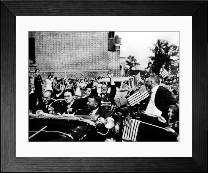 Framed Print : Franklin Roosevelt campaigns for President in Atlanta, Georgia. Oct. 24, 1932. From an open car, FDR waves while holding a horse shoe. (BSLOC_2013_5_92)