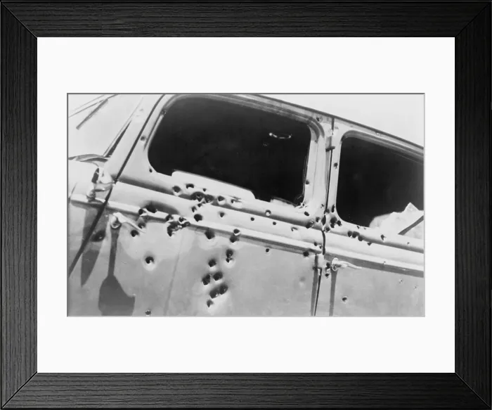 Framed Print : The bullet riddled car in which bank robbers Bonnie and Clyde died at the hands of Texas Rangers and Louisana police at Gibsland, Louisiana on May 23, 1934 Framed Print : The bullet riddled car in which bank robbers Bonnie and Clyde died at the hands of Texas Rangers and Louisana police at Gibsland, Louisiana on May 23, 1934