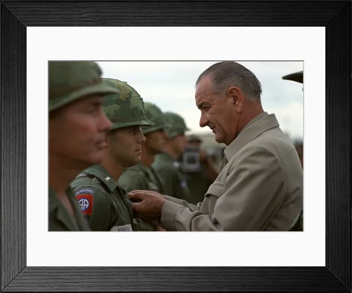 Framed Print : President Johnson in South Vietnam. LBJ awards the Distinguished Service Cross to a First Lieutenant at Cam Ranh Bay, South Vietnam. Oct. 26, 1966
