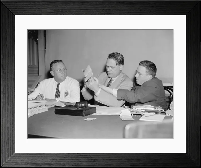 Framed Print : HUAC Chairman Martin Dies (center) views communist evidence, Aug. 1938. At right is investigator Edward F