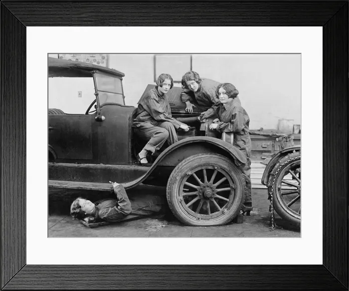 Framed Print : Overall clad high school girls learn automobile mechanics in Washington, D.C
