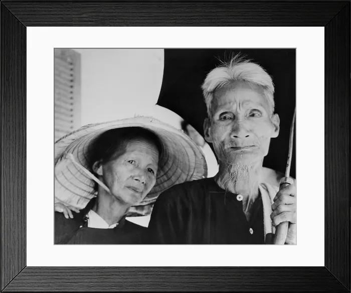 Framed Print : Elderly South Vietnamese refugees. Elderly couple in a US Marine Corps-sponsored refugee camp at Le My, Vietnam after they were evacuated from Viet Cong infiltrated areas. 1965