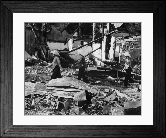 Framed Print : Aftermath of Tet Offensive. Three Vietnamese women return to their homes in the ruins in of the Cholon area of Saigon after a Viet Cong Tet Offensive. January 31, 1968 Framed Print : Aftermath of Tet Offensive. Three Vietnamese women return to their homes in the ruins in of the Cholon area of Saigon after a Viet Cong Tet Offensive. January 31, 1968