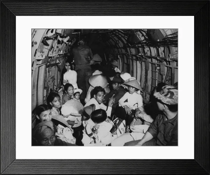 Framed Print : Vietnam refugees evacuated. US Air Force helicopter take refugees to a safe area near Saigon after their village was attacked by Viet Cong. March 1966