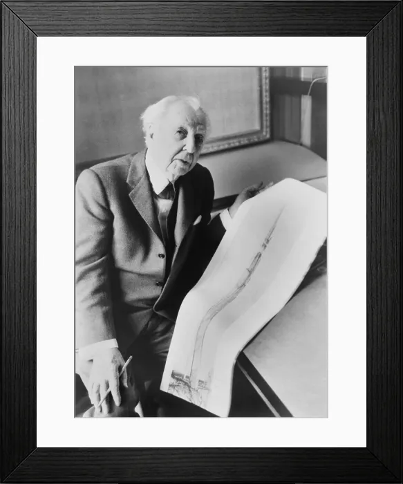 Framed Print : Frank Lloyd Wright (1867-1959), American master architect holding sketch of a 528 story office building he designed. The mile high skyscraper was never built. 1957 Framed Print : Frank Lloyd Wright (1867-1959), American master architect holding sketch of a 528 story office building he designed. The mile high skyscraper was never built. 1957