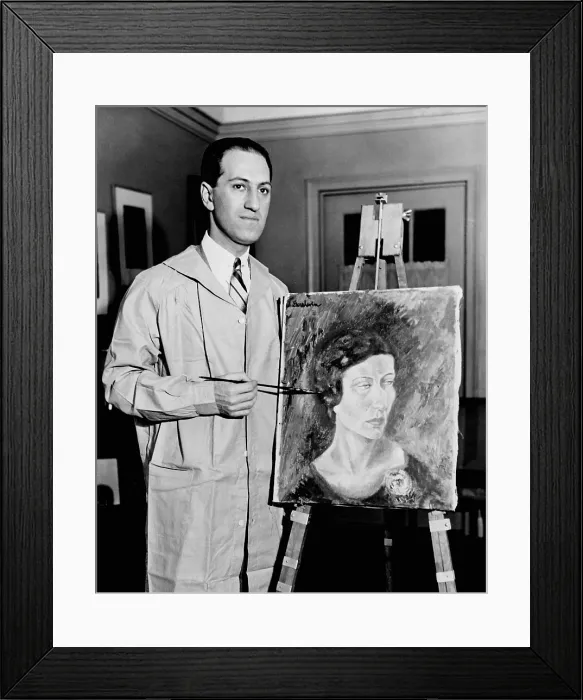 Framed Print : George Gershwin ( 1898-1937) American composer was also a painter, posing with his first oil painting. 1931