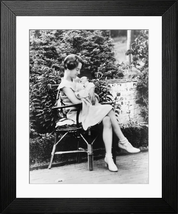 Framed Print : Anne Morrow Lindbergh in 1930, holding her first son, Charles A. Lindbergh Jr. a few weeks after his birth. He would be kidnapped and murdered before his 2nd birthday