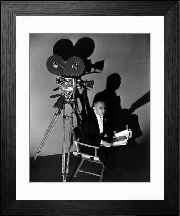 Framed Print : THREE FACES EAST, Erich von Stroheim awaits his cue, on-set, 1930