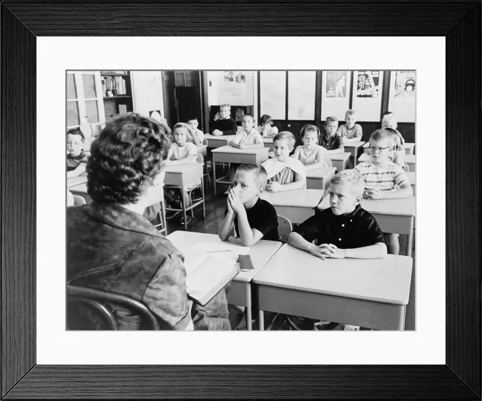 Framed Print : Second grade students listen as their teacher, reads a passage from the Bible in 1962 to substitute for the school prayers that were declared unconstitutional by the U.S