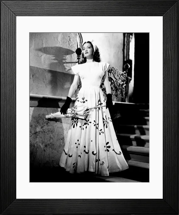 Framed Print : MASQUERADE IN MEXICO, Dorothy Lamour, modeling a linen garden-party dress with black mesh cut-outs, 1945 Framed Print : MASQUERADE IN MEXICO, Dorothy Lamour, modeling a linen garden-party dress with black mesh cut-outs, 1945