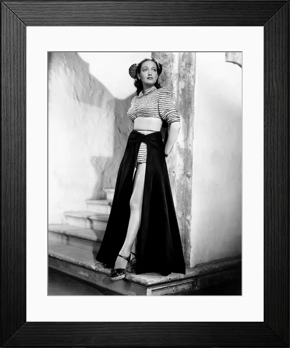 Framed Print : MASQUERADE IN MEXICO, Dorothy Lamour, modeling a bikini with a cape that can also be used as a skirt, 1945 Framed Print : MASQUERADE IN MEXICO, Dorothy Lamour, modeling a bikini with a cape that can also be used as a skirt, 1945
