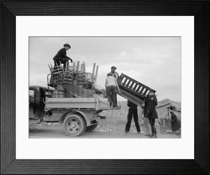 Framed Print : State highway officials moving protesting sharecroppers, Jan. 1936. Roadside belongings are loaded into trucks as a policeman watches, ending the protest Framed Print : State highway officials moving protesting sharecroppers, Jan. 1936. Roadside belongings are loaded into trucks as a policeman watches, ending the protest