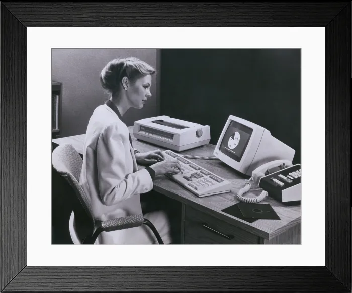 Framed Print : Women using an early personal computer made by the Digital Equipment Corporation of Maynard Massachusetts in 1982
