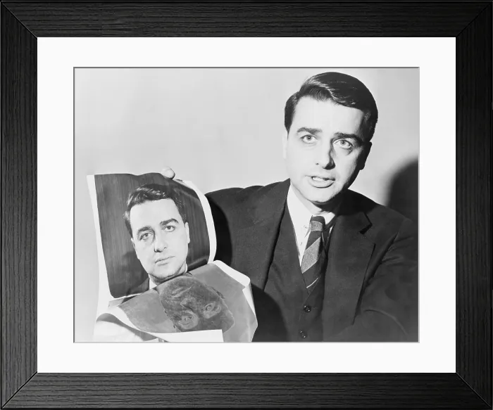 Framed Print : Edwin Herbert Land (1909-1991), American scientist and inventor, holding a polaroid photograph of himself, taken by the camera he invented
